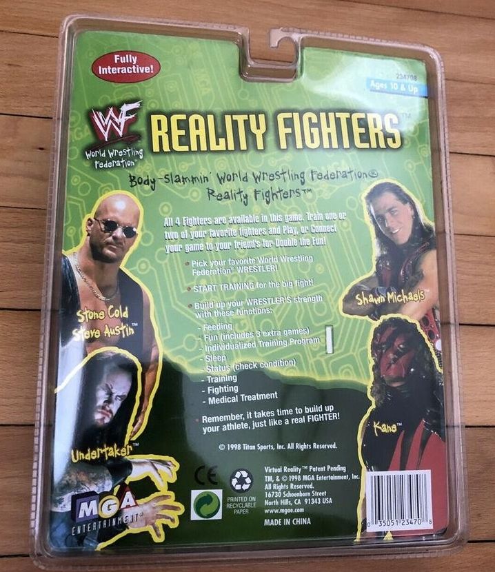 Reality Fighters WWF Steve Austin Electronic Handheld w/ Clip Cable PWcatalog