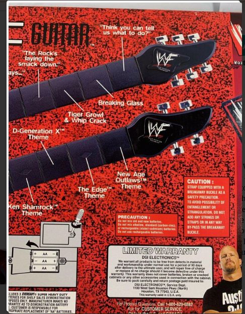 WWF Double Neck Guitar 1999 by DSI Toys PWcatalog