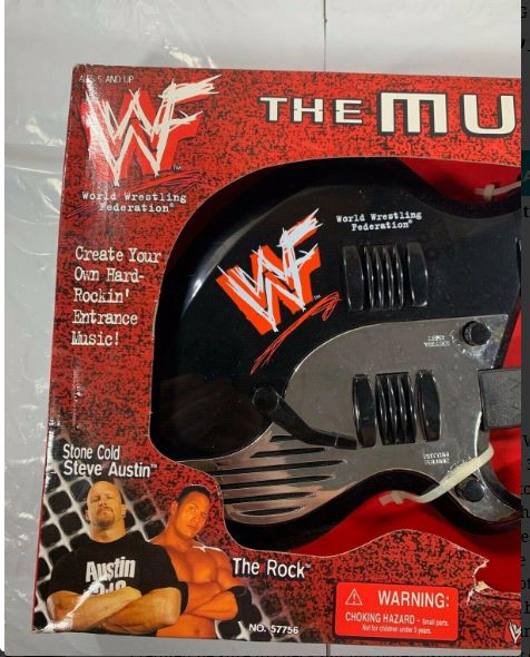 WWF Double Neck Guitar 1999 by DSI Toys PWcatalog