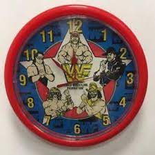 WWF wall clock 90`s Hulk Hogan, Bret Hart, Ultimate Warrior, Macho Man, Undertaker Watches PWcatalog
