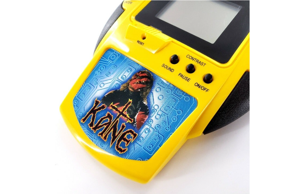 Reality Fighters WWF Kane Electronic Handheld w/ Clip Cable