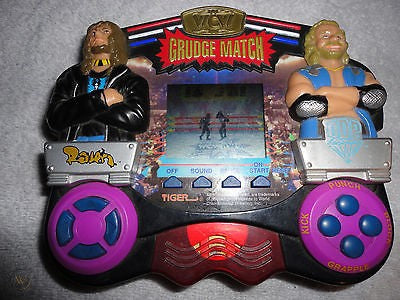 WCW/NWO Grudge Match Handheld LCD Raven DDP - image 2